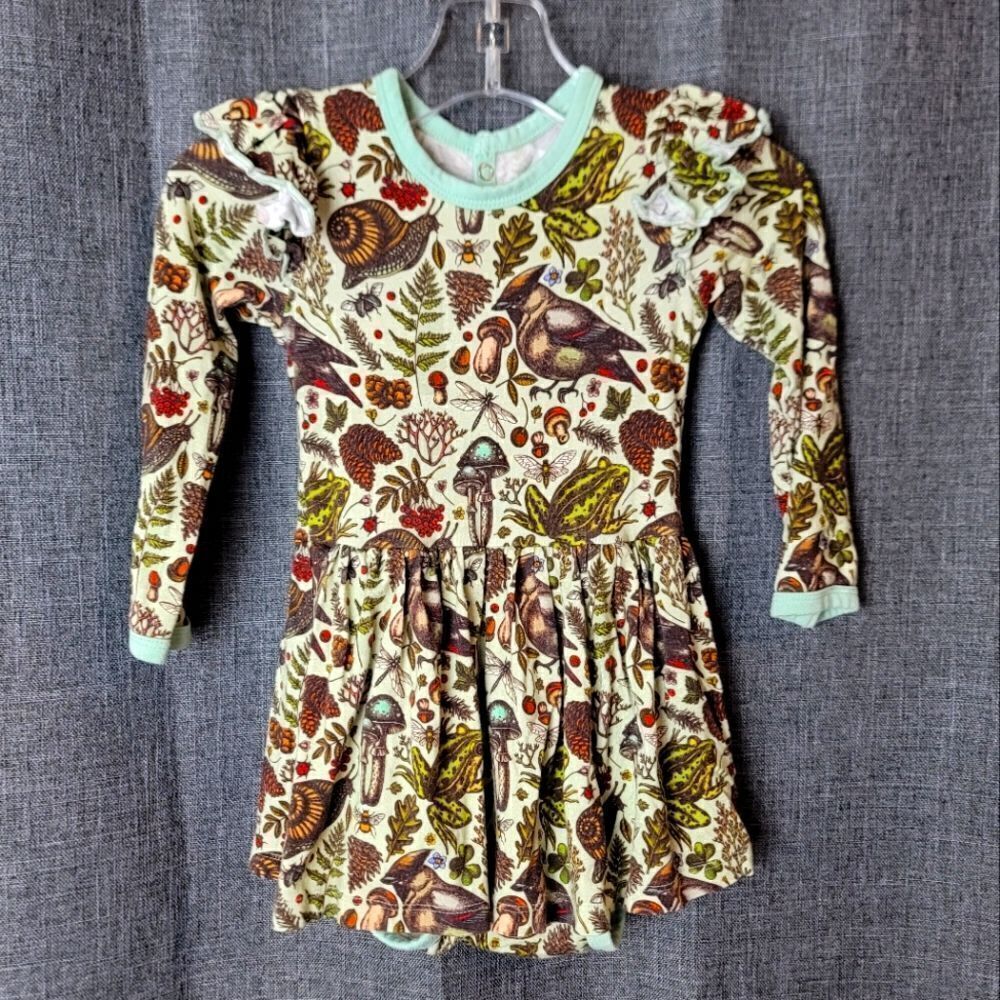 NEV CLOTHING Long Sleeve Twirl Bodysuit